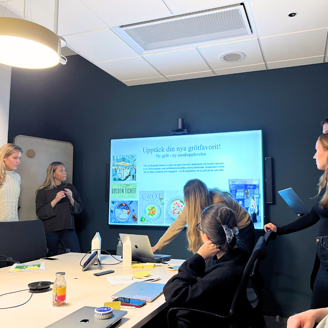 Students presenting at Fazer Head Office in a conferance room