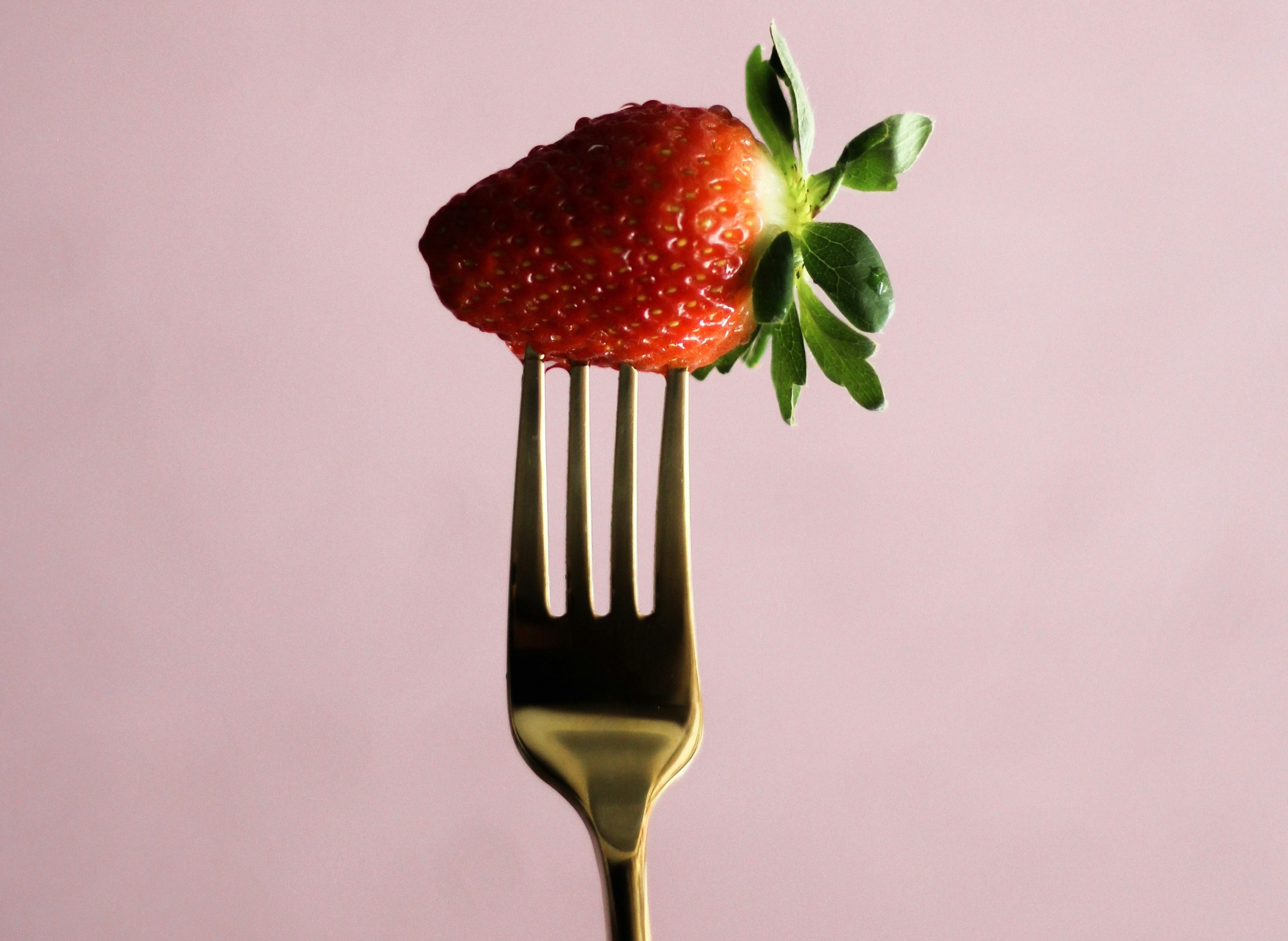 Strawberry on fork