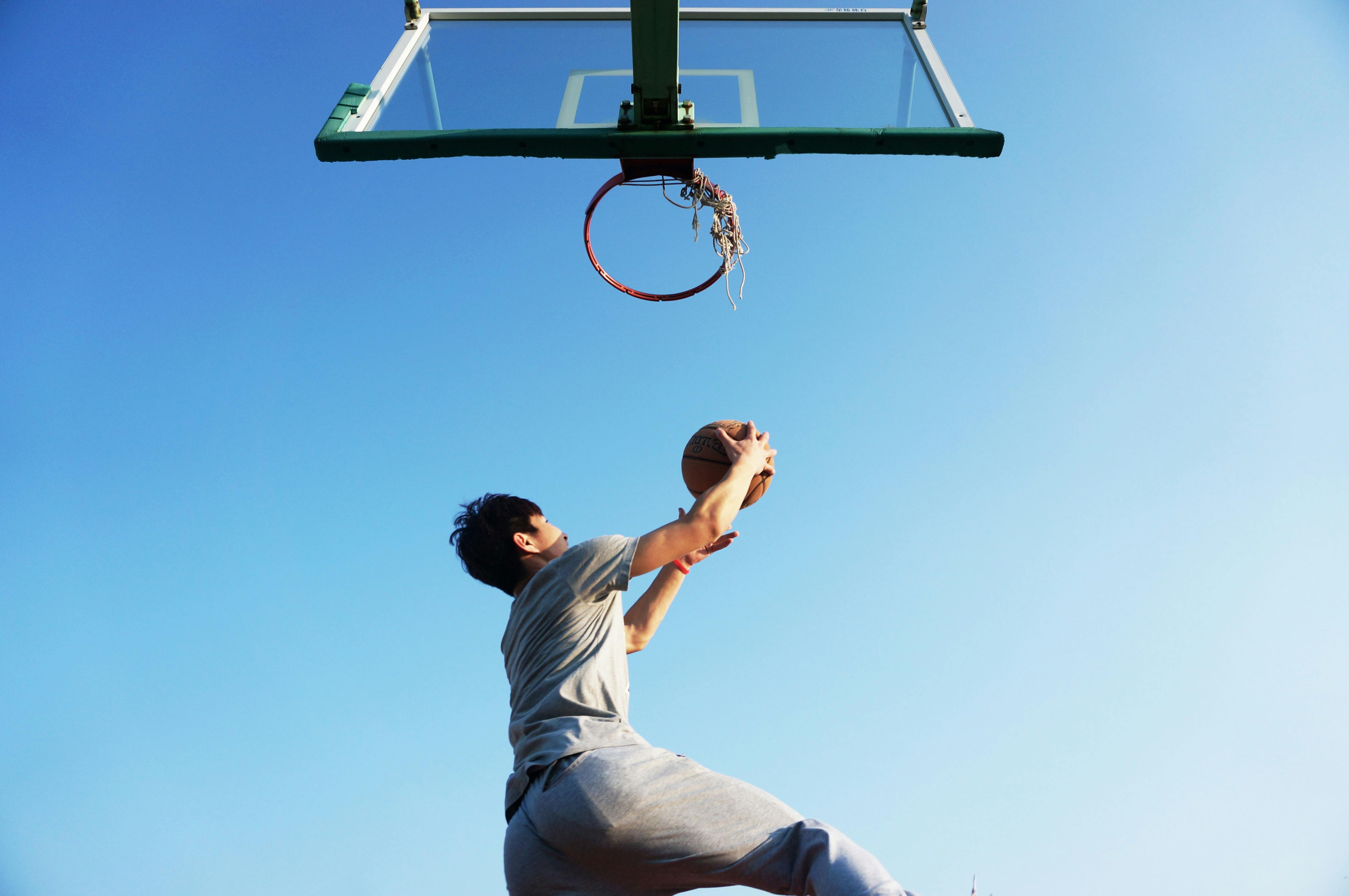 Basketball player going in for a shot