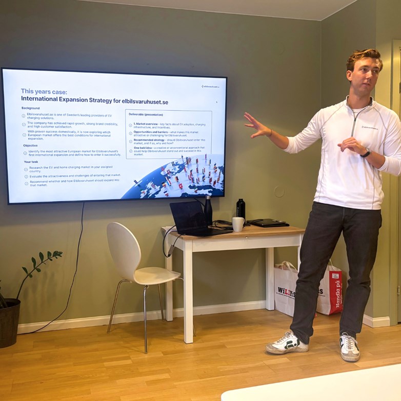 CEO and Co-founder Filip Lars Sernhede presenting in fron of a TV screen