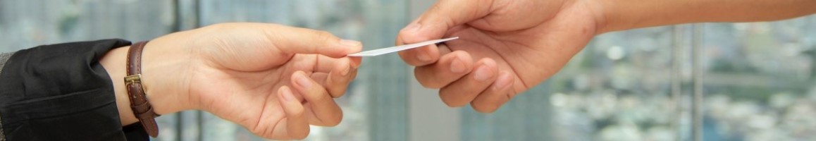 Hand holding library card