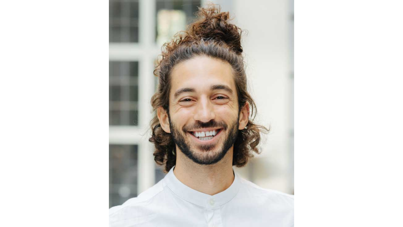 Portrait photograph of Claude Raisaro, affiliated researcher at the House of Sustainable Society.