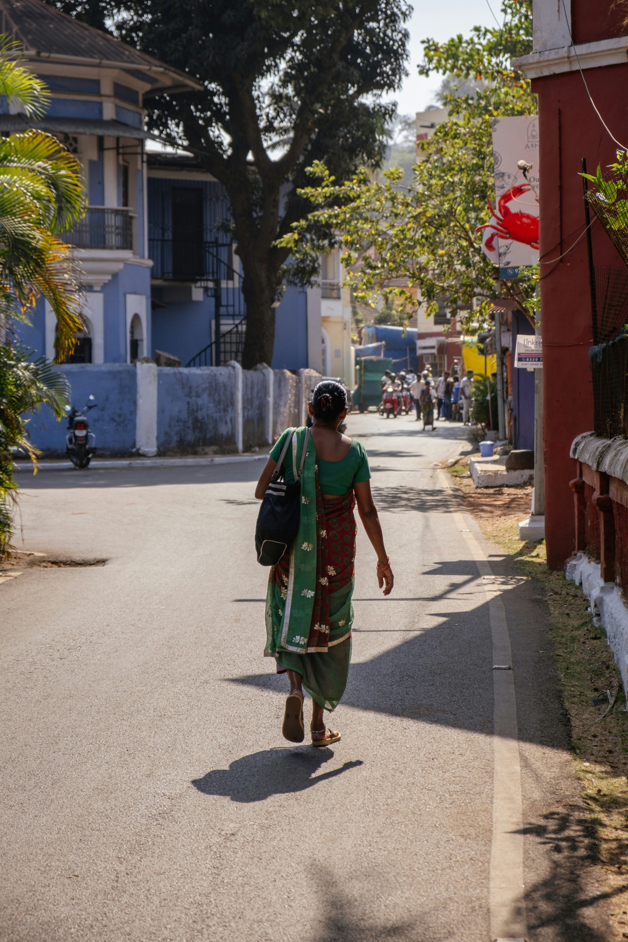 Woman walking down the street in India